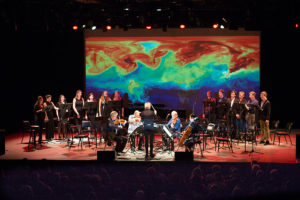 The Kronos Quartet with the Æon Music Ensemble and Æon Singers, playing Vladislav Boguinia's "Rise," at the Symphony Space in New York on Sept. 23, 2015. (Benjamin Chasteen/Epoch Times)